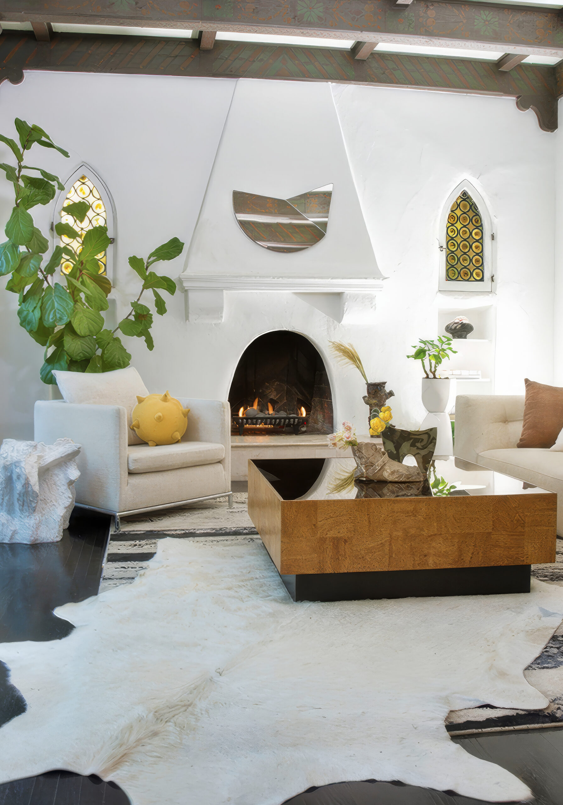 Kim Colwell Design Los Angeles — white living room with arched fireplace and cowhide rug