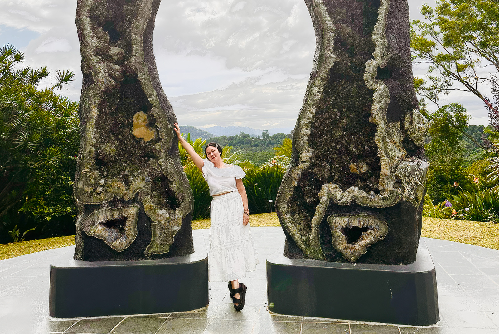 Crystal Castle's huge amethyst crystals are the perfect landscape for Kim Colwell's portrait to express the essence of her feng shui offerings. 