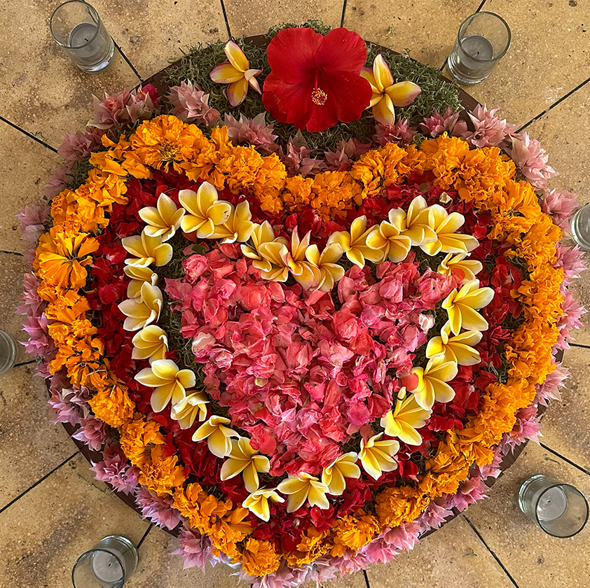 Heart shaped floral mandala is used in Kim Colwell's House Blessing Ceremony, Los Angeles.