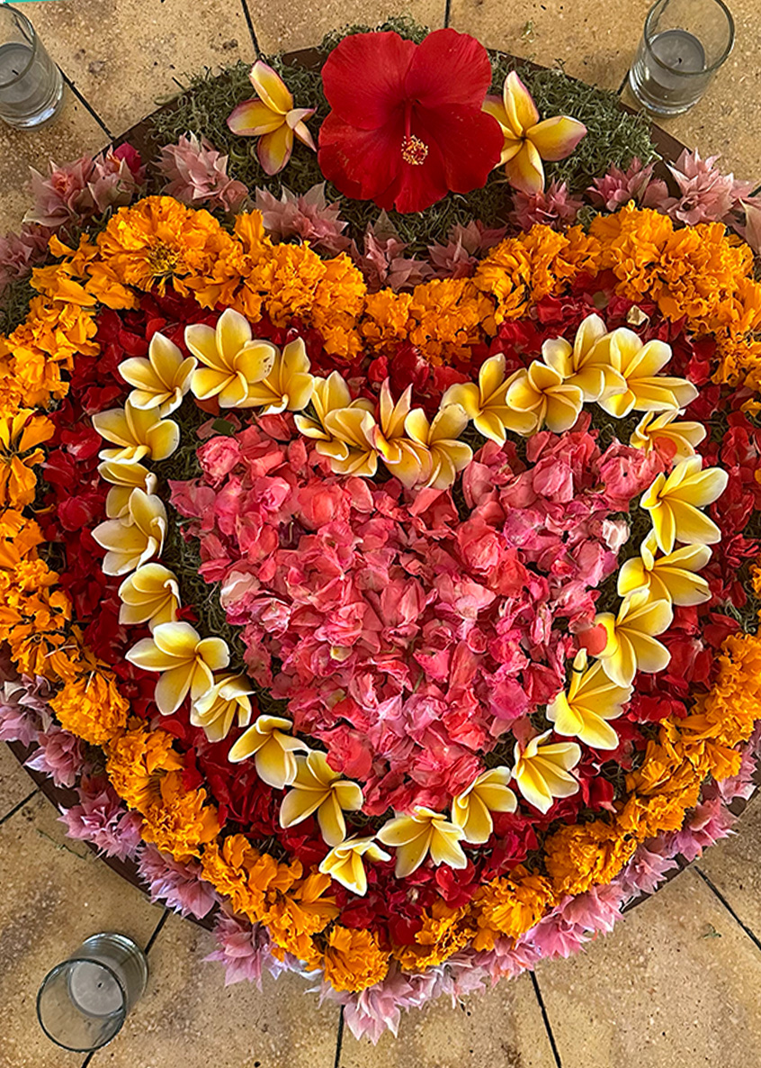 Flower mandala with marigolds and candles, from a Kim Colwell House Blessing Ceremony class — offered in Los Angeles or virtually via Zoom